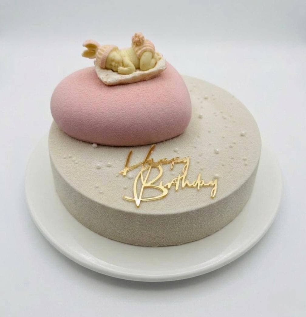 Delicate pink baby shower bento cake with figurine — handcrafted